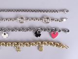 several different types of bracelets are shown on a white surface