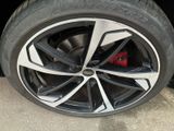 the tire of a car is shown with the rim on it