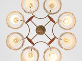 a close up of a light fixture on a white wall