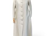 an image of a mannequin dressed in a white coat