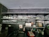 many glasses on the shelves in the kitchen