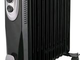 une image représentant un radiateur à huile noir sur fond blanc