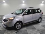 a picture of a silver van parked in a garage