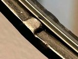 an image of a close up of a window with a broken glass
