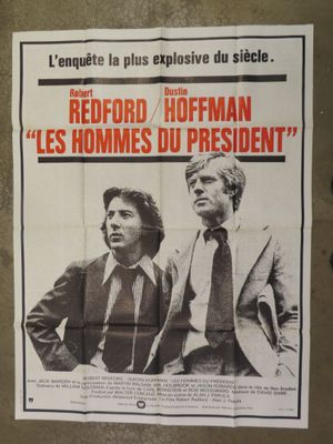 poster of two men standing next to each other in front of a wall