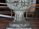 a vase that is sitting on a wooden table