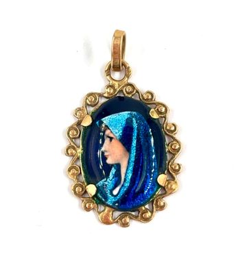 an image of a pendant with a woman wearing a blue veil