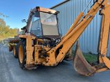 an image of a backhoe of a construction vehicle