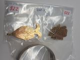 a bag with some metal items in it on a table