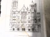 un vieux livre sur lequel figure le dessin d'une église