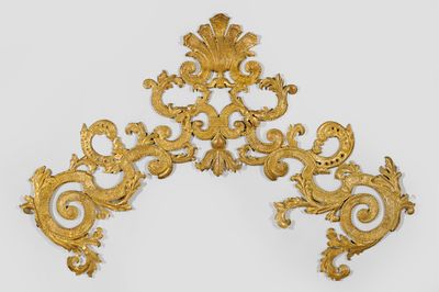 pair of antique gold leaf and flower wall sconces on a white background