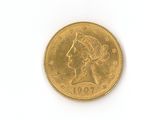 une image d'une pièce d'or sur une surface blanche