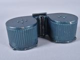 a pair of blue salt and pepper shakers on a table