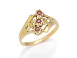 a gold ring with a pink stone center