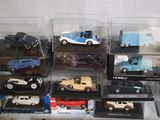 a lot of toy cars in a display case