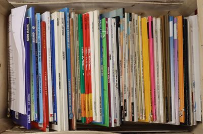 a box full of books that are sitting on a table