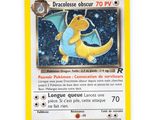 a close up of a pokemon card on a white surface