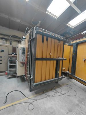 a large machine that is sitting inside of a building
