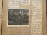 un vieux journal sur lequel figure la photo d'un homme