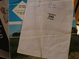 a piece of paper sitting on top of a pile of papers