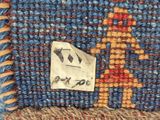 a close up of a piece of cloth with a sticker on it