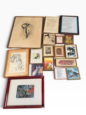 a lot of framed art on a white surface
