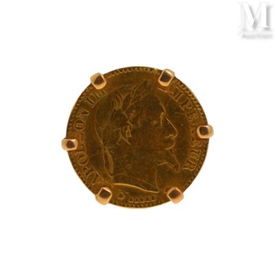 l'image d'une pièce d'or sur laquelle figure le visage d'une femme