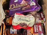 a cardboard box filled with assorted snacks and snacks
