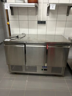 a stainless steel counter in a commercial kitchen