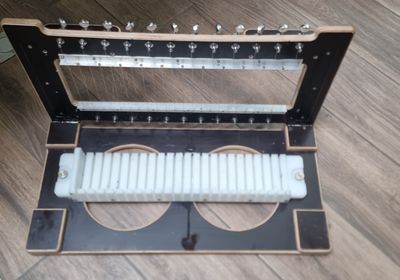 a wooden box with cigarettes in it sitting on the floor