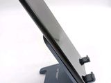 a cell phone that is sitting on a stand
