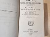 a book open on a table with a picture of the title