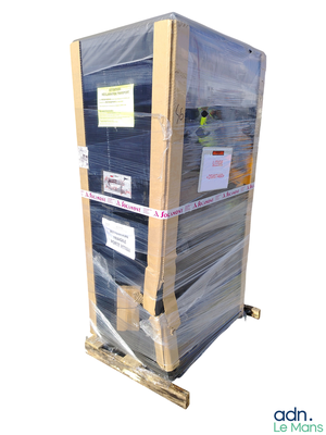 a pallet with a stack of boxes on top of it