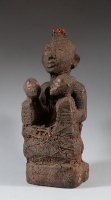 an image of a statue of a woman holding a baby