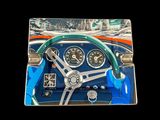 a picture of a picture of a car dashboard with a steering wheel