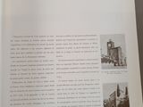an open book with a picture of a building on it