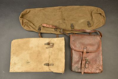 three different types of bags sitting on top of a table