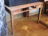 a suitcase sitting on top of a table in a room