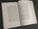 an open book that is sitting on a table