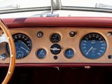 a steering wheel and gauges in the dashboard of a car