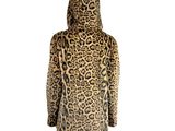 the back view of a woman wearing a leopard print coat