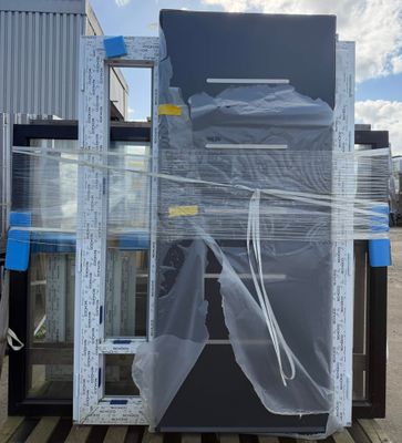 a picture of a refrigerator that is wrapped up and ready to be shipped