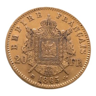 Gros plan sur une pièce d'or ornée d'une couronne
