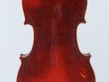 an old violin with a wooden back and a long neck