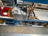 a blue workbench with a bunch of tools on it