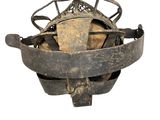 an old iron pot that has been placed on a white background