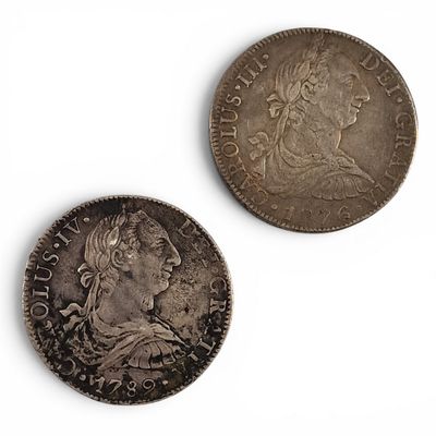 deux pièces d'argent, dont l'une représente un buste et l'autre un buste