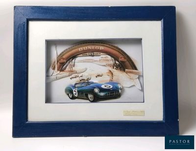 framed photograph of a blue sports car in a blue frame on a white background