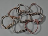 five pairs of glasses sitting on top of a table