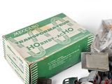 a box of assorted items sitting on a white surface
